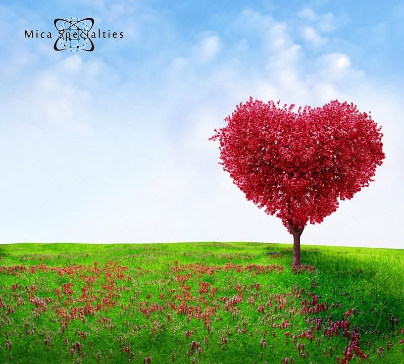 Mica Specialties logo above a heart-shaped tree in a green meadow